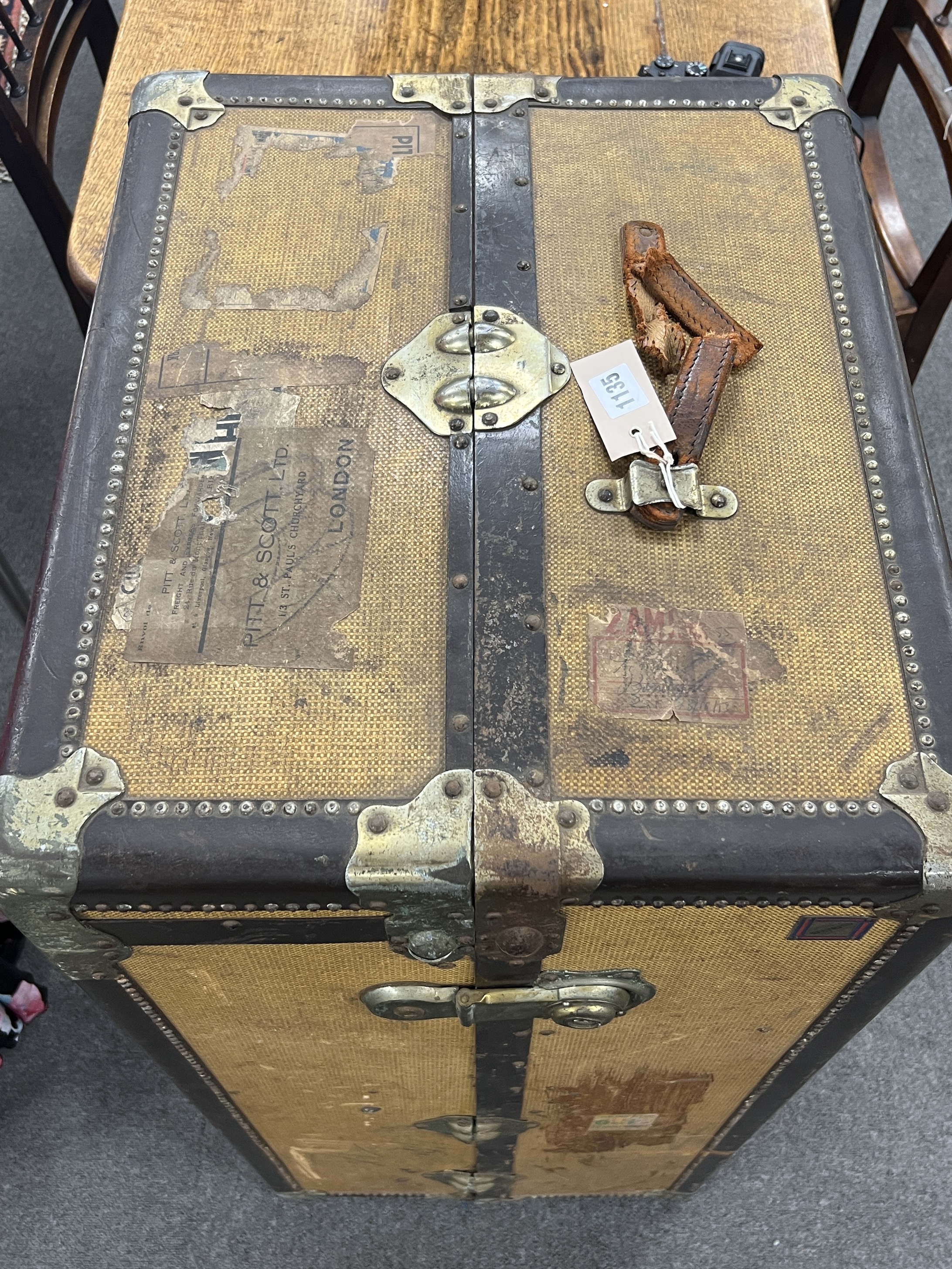 A vintage travelling trunk, (no key) width 103cm, depth 56cm, height 46cm